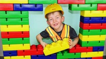 Lego game idea - Mom, dad and son make a colorful house out of lego.